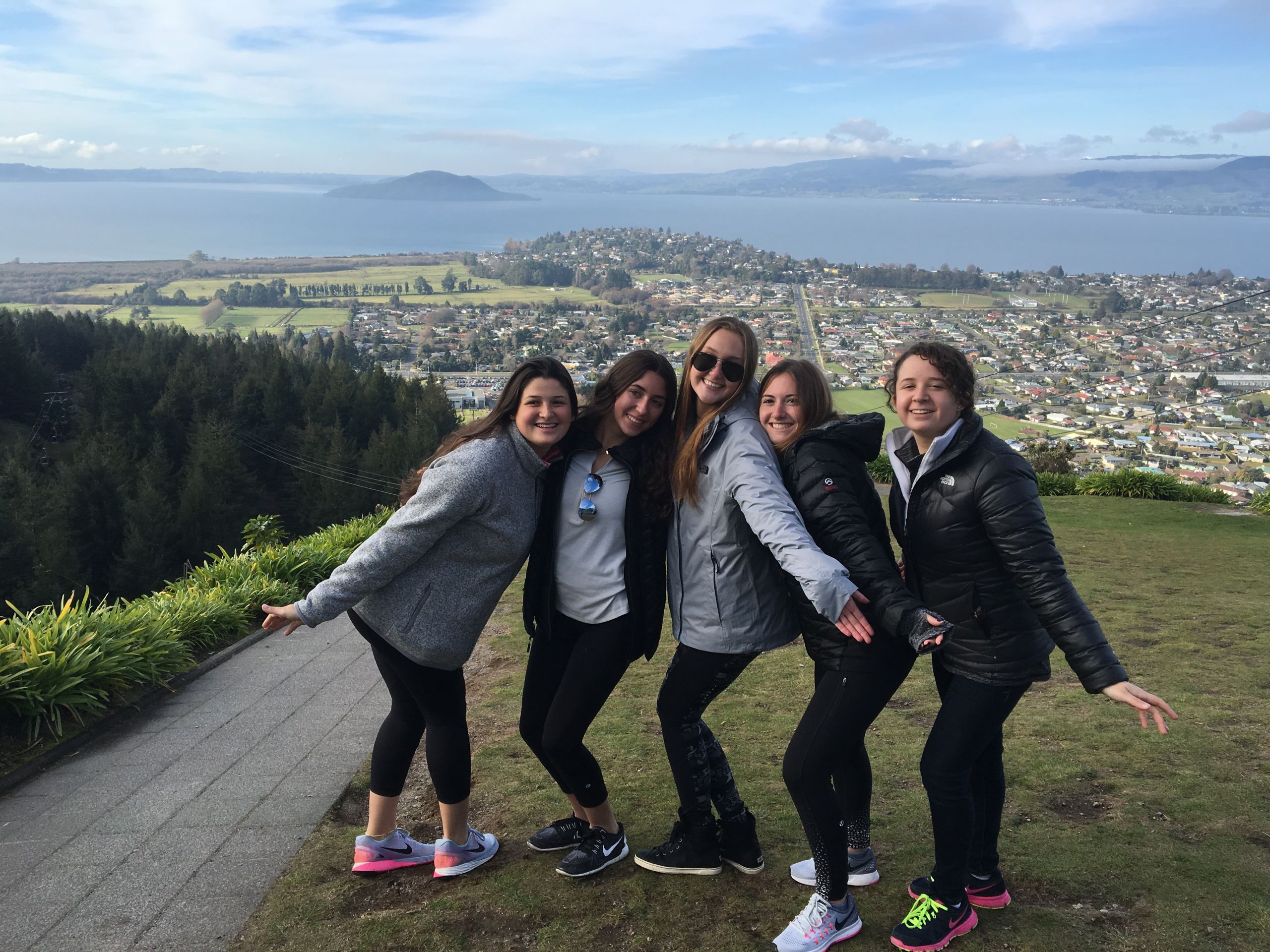 Teen on top of a beautiful hill in Auckland New Zealand